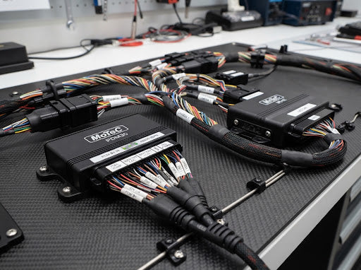 Opto-Isolated Concentric Wiring Architecture for Multi-Car Fleet